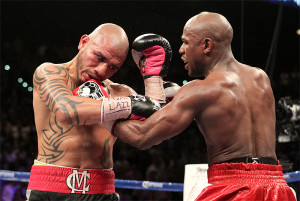 Floyd Mayweather Shows His Toughness against Hard-Hitting Miguel Cotto