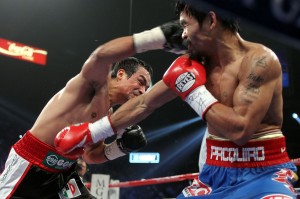 Manny Pacquio defeats Juan Manuel Marquez by Majority Decision