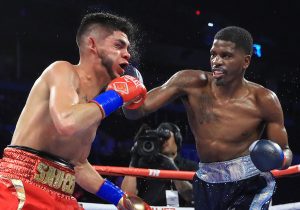 Top Rank Boxing on ESPN Results: Hooker Retains Title, Stops Saucedo in 7th
